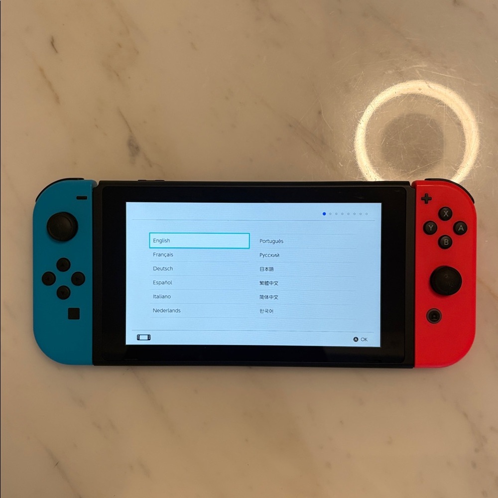 Complete Nintendo Switch Console + 2-Pc Racing Wheels Set ($10 value) - Picture 7 of 7